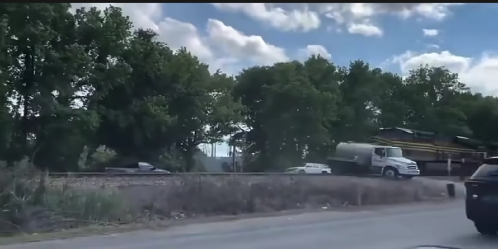  train accident, septic truck crash Virginia, train vs septic truck, Chesapeake Virginia collision, train crash driver hospitalized, rail crossing accident Virginia